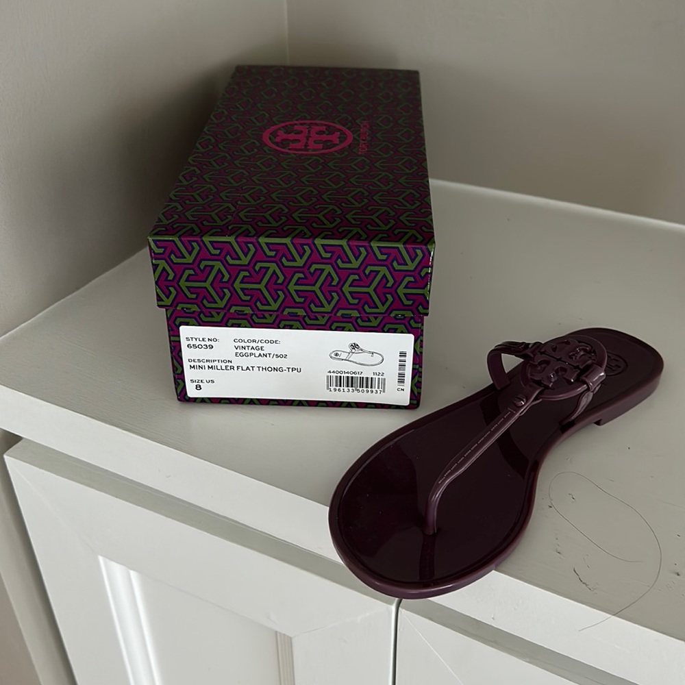 Tory Burch mini Miller jelly thong in vintage eggplant.